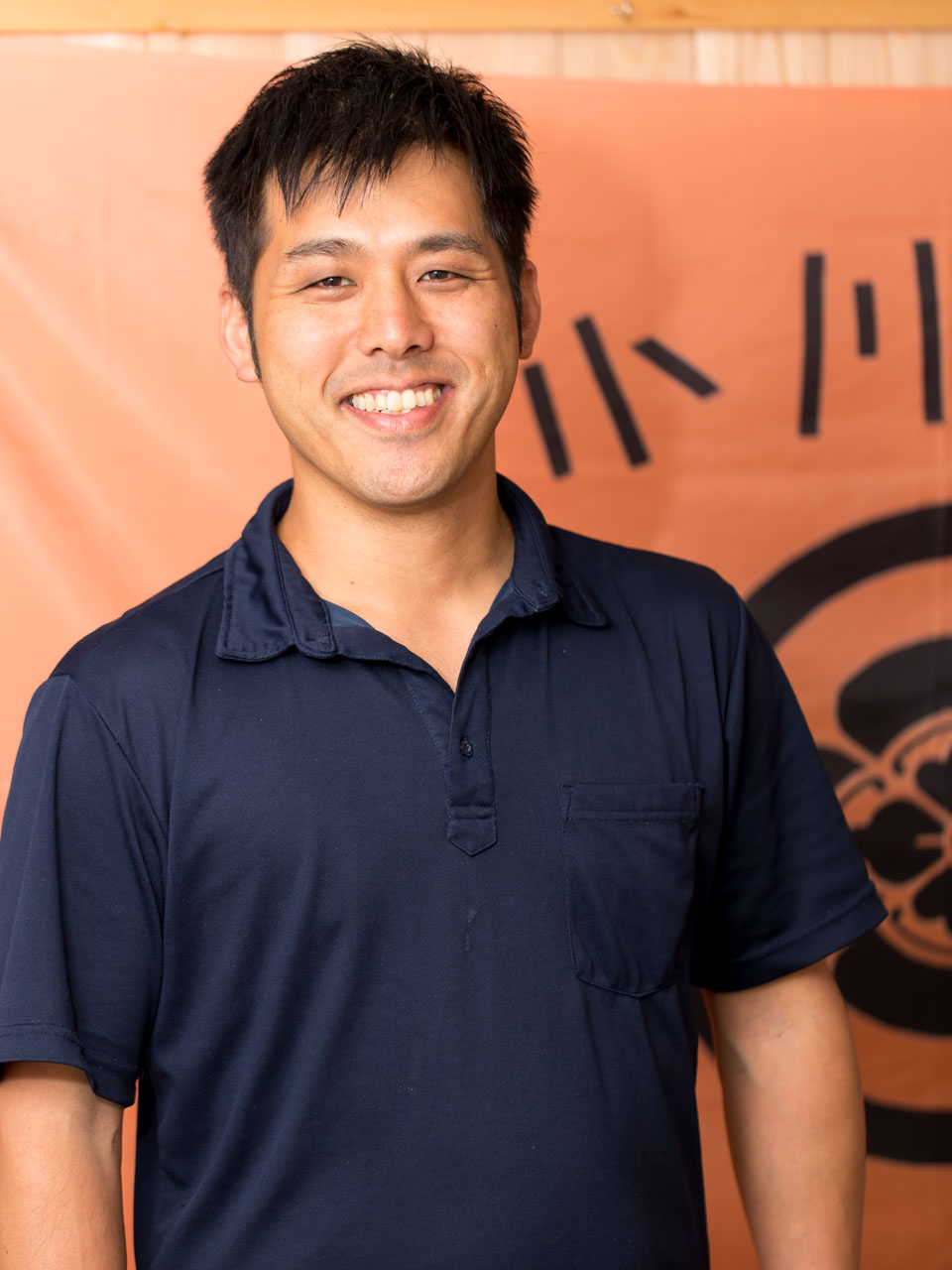 小川ん家の施術者・小川祐輔の顔写真